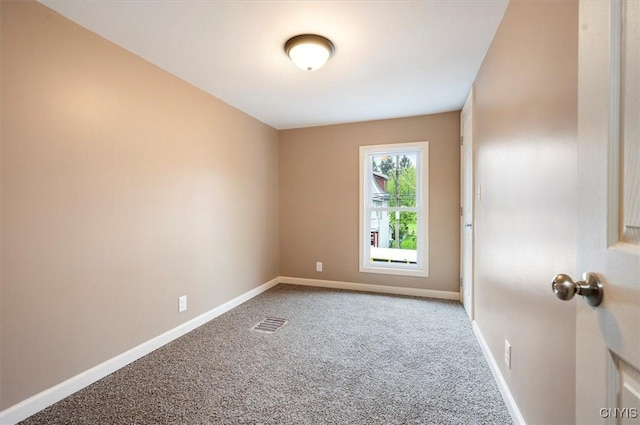 212 N Broad St, Oneida-Inside, NY 13421 - carpeted empty room featuring baseboards