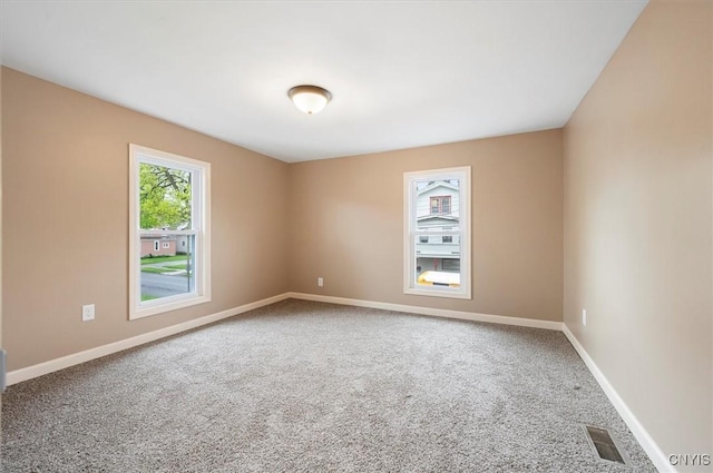 212 N Broad St, Oneida-Inside, NY 13421 - carpeted spare room with baseboards