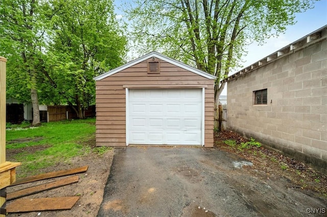 212 N Broad St, Oneida-Inside, NY 13421 - detached garage with fence and asphalt driveway