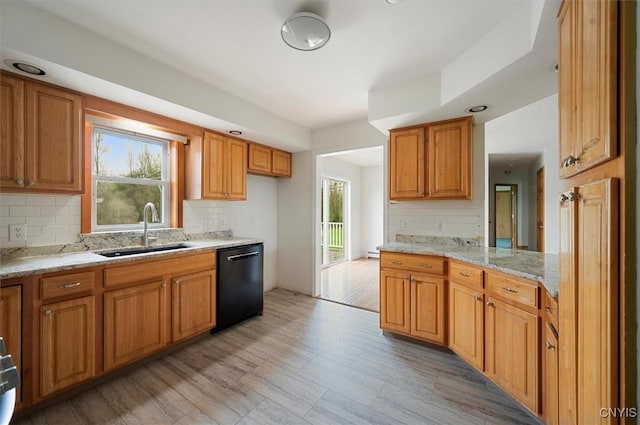 120 Getmac Ave, Lenox, NY 13032 - kitchen featuring black dishwasher, a sink, plenty of natural light, and decorative backsplash