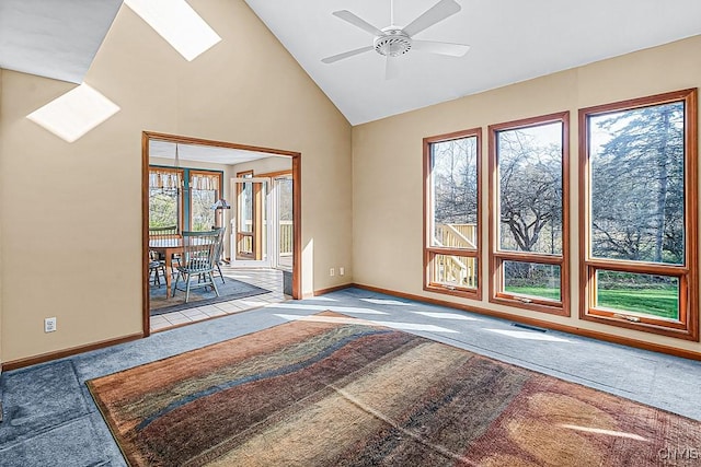 7629 Creek Farm Ln, Trenton, NY 13354 - carpeted empty room featuring plenty of natural light, baseboards, a ceiling fan, and high vaulted ceiling