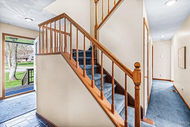 7629 Creek Farm Ln, Trenton, NY 13354 - stairway featuring baseboards