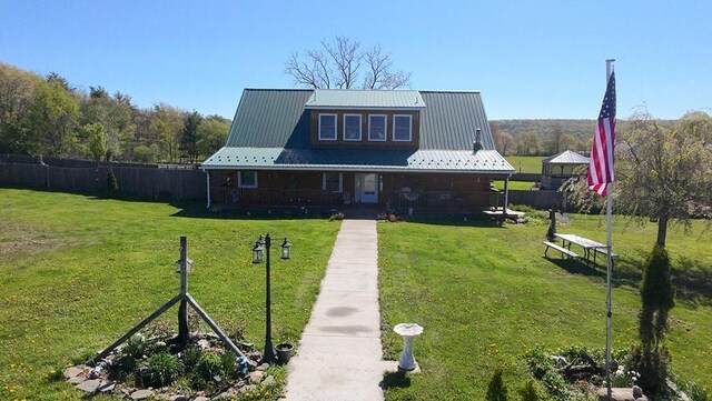 4138 Hubbs Rd, Hector, NY 14818 - view of front of property featuring a porch and metal roof