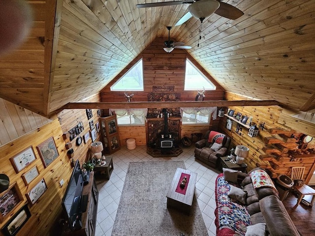4138 Hubbs Rd, Hector, NY 14818 - tiled living area with wooden walls, ceiling fan, wood ceiling, and high vaulted ceiling