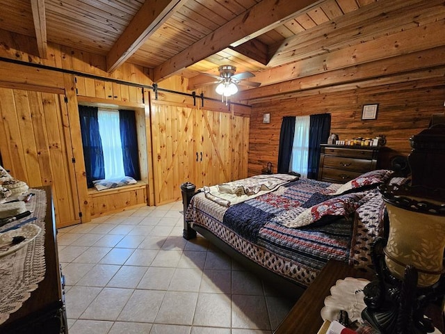 4138 Hubbs Rd, Hector, NY 14818 - bedroom featuring wood ceiling with exposed beams, wood walls, light tile patterned floors, and a barn door