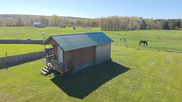 4138 Hubbs Rd, Hector, NY 14818 - exterior view of metal roof and log siding