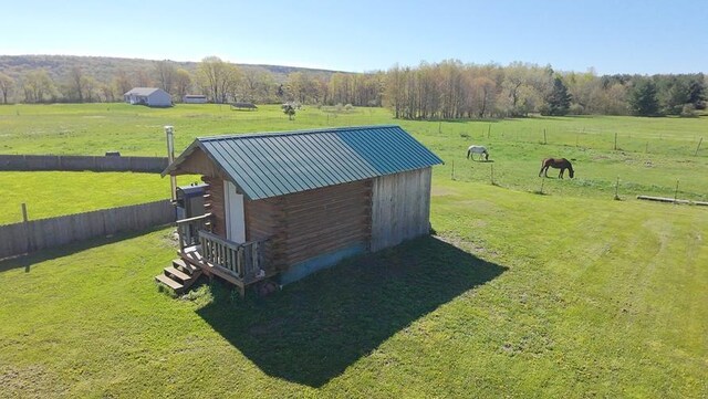 4138 Hubbs Rd, Hector, NY 14818 - exterior view of metal roof and log exterior