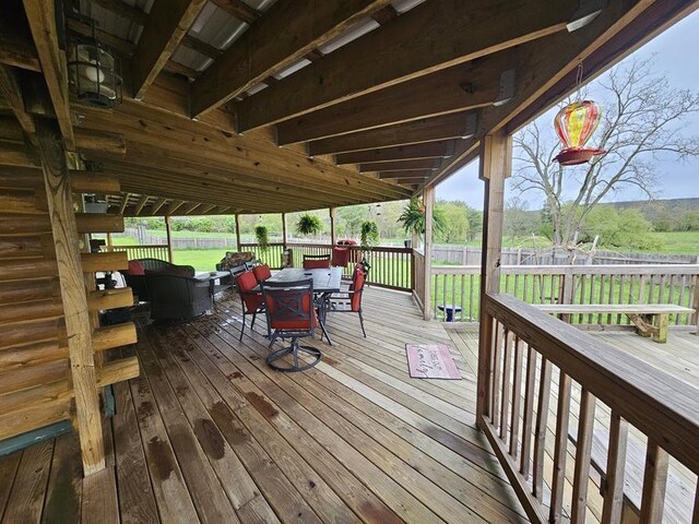 4138 Hubbs Rd, Hector, NY 14818 - deck featuring outdoor dining area and a fenced backyard