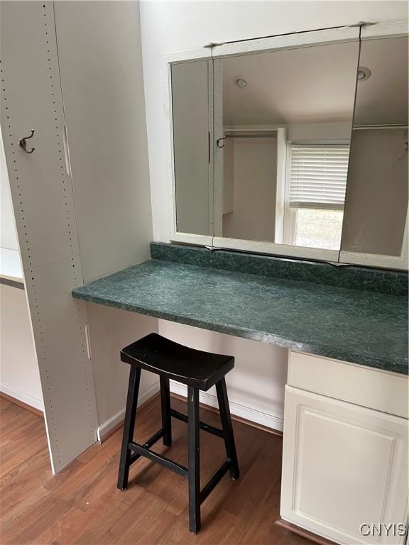10 Sage Ct, Utica, NY 13502 - bathroom with wood finished floors
