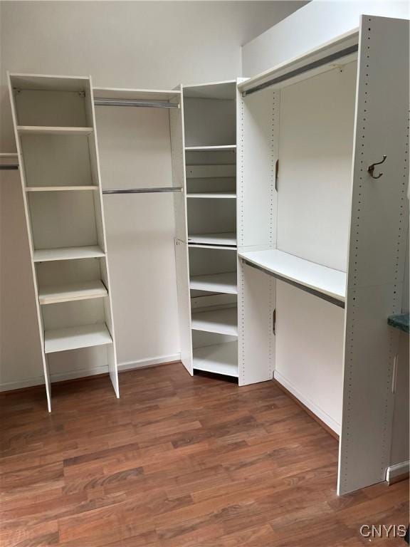 10 Sage Ct, Utica, NY 13502 - spacious closet with wood finished floors