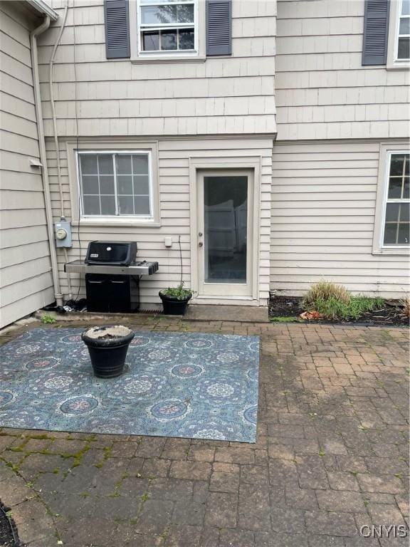 10 Sage Ct, Utica, NY 13502 - doorway to property featuring a patio area