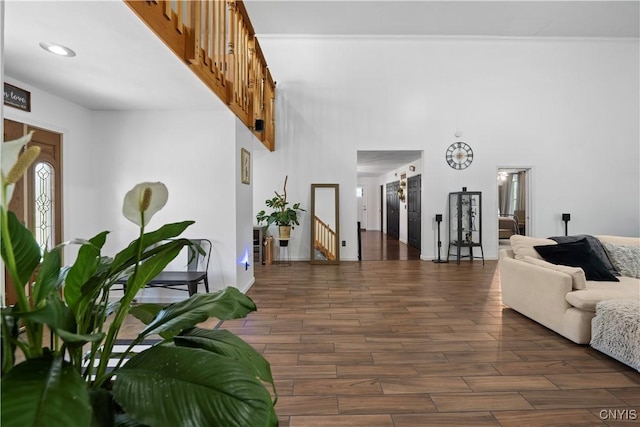 7678 Totman Rd, Cicero, NY 13212 - foyer with wood finished floors, stairway, a high ceiling, and recessed lighting