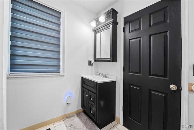 7678 Totman Rd, Cicero, NY 13212 - bathroom with tile patterned floors, vanity, and baseboards