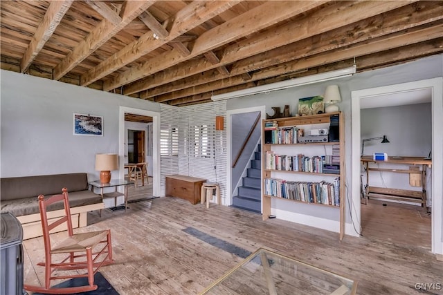 3323 County Route 95, Worth, NY 13659 - basement featuring wood finished floors, wooden ceiling, and stairs