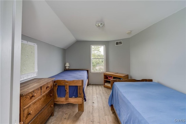 3323 County Route 95, Worth, NY 13659 - bedroom featuring light wood-style flooring and vaulted ceiling