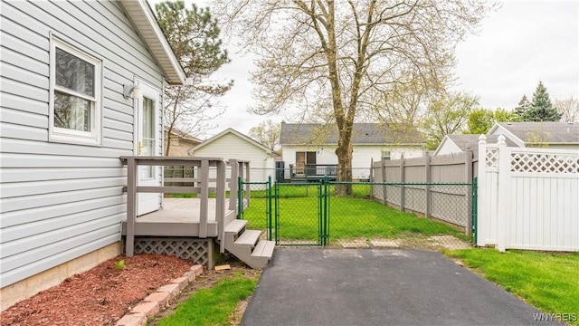 1350 Caravelle Dr, Niagara Falls, NY 14304 - view of yard featuring a gate and a deck