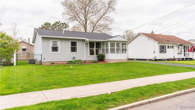 1350 Caravelle Dr, Niagara Falls, NY 14304 - ranch-style house with a sunroom and cooling unit