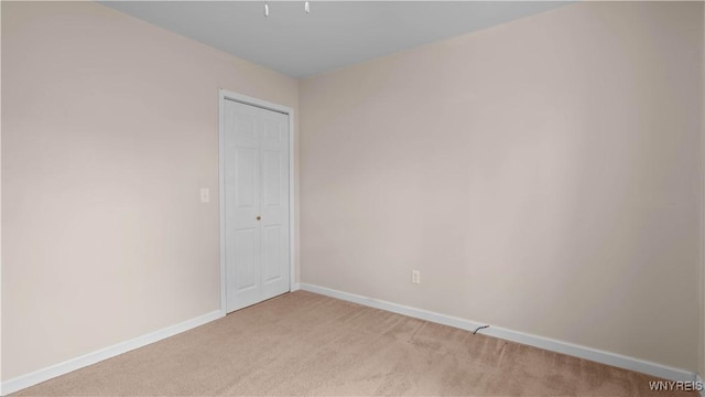 1350 Caravelle Dr, Niagara Falls, NY 14304 - unfurnished room with light colored carpet and baseboards