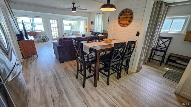 5416 W Lake Rd, Fleming, NY 13021 - dining area with light wood-style floors and a ceiling fan
