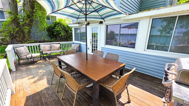 5416 W Lake Rd, Fleming, NY 13021 - wooden deck featuring an outdoor living space, outdoor dining space, and grilling area