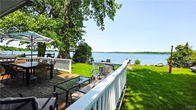 5416 W Lake Rd, Fleming, NY 13021 - wooden terrace featuring a water view, a yard, and outdoor dining space