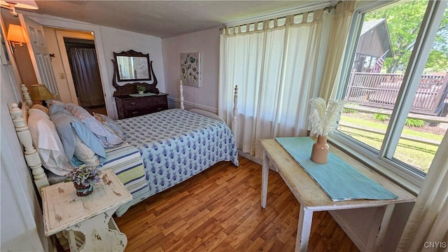 5416 W Lake Rd, Fleming, NY 13021 - bedroom featuring wood finished floors