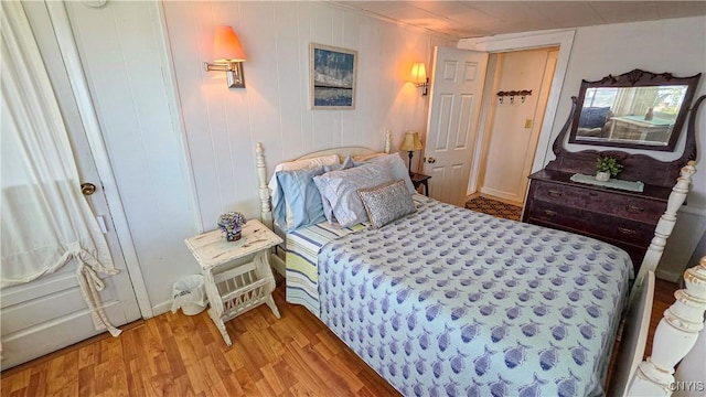 5416 W Lake Rd, Fleming, NY 13021 - bedroom with light wood-style flooring
