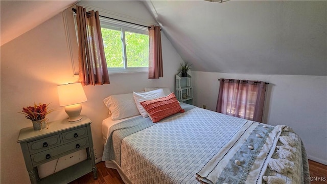 5416 W Lake Rd, Fleming, NY 13021 - bedroom featuring wood finished floors and lofted ceiling