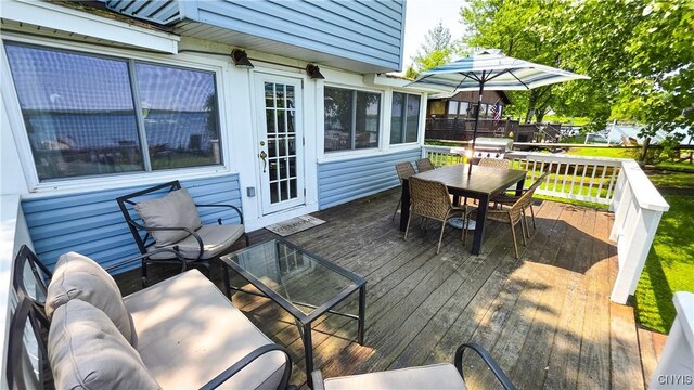 5416 W Lake Rd, Fleming, NY 13021 - wooden terrace with outdoor dining space