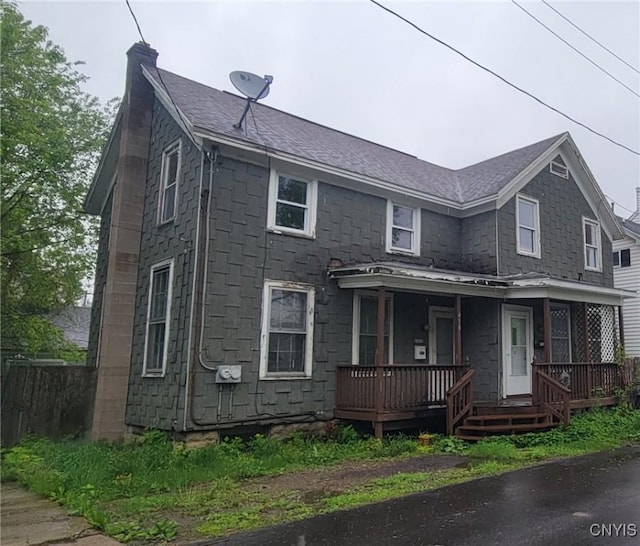 416 Pond St, Rome-Inside, NY 13440 - view of front of home featuring a chimney, a shingled roof, and covered porch