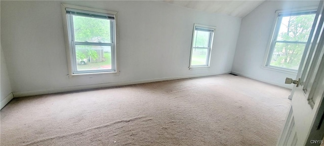416 Pond St, Rome-Inside, NY 13440 - carpeted empty room featuring baseboards and vaulted ceiling
