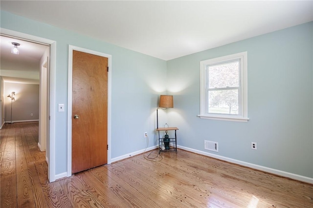 119 Underwood Ave, Parma, NY 14468 - unfurnished bedroom with wood finished floors and baseboards