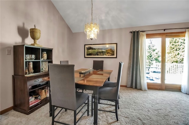761 Pletcher Rd, Lewiston, NY 14092 - carpeted dining space featuring a chandelier, baseboards, and vaulted ceiling