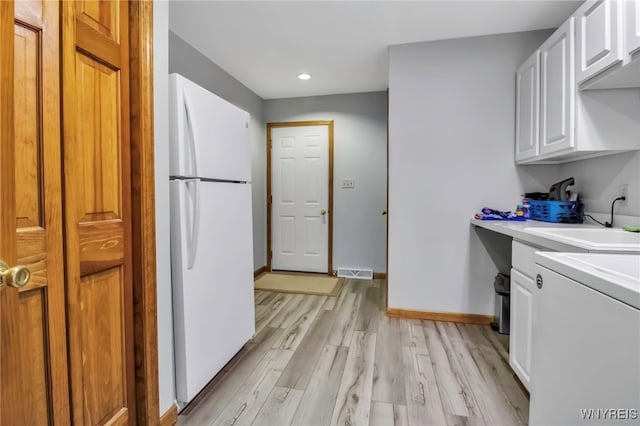 761 Pletcher Rd, Lewiston, NY 14092 - washroom featuring a sink, light wood-style flooring, recessed lighting, and baseboards