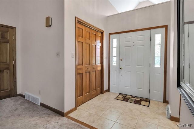 761 Pletcher Rd, Lewiston, NY 14092 - foyer entrance featuring baseboards, light tile patterned flooring, and light carpet