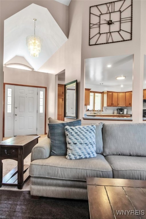 761 Pletcher Rd, Lewiston, NY 14092 - living room featuring a chandelier, a towering ceiling, and recessed lighting