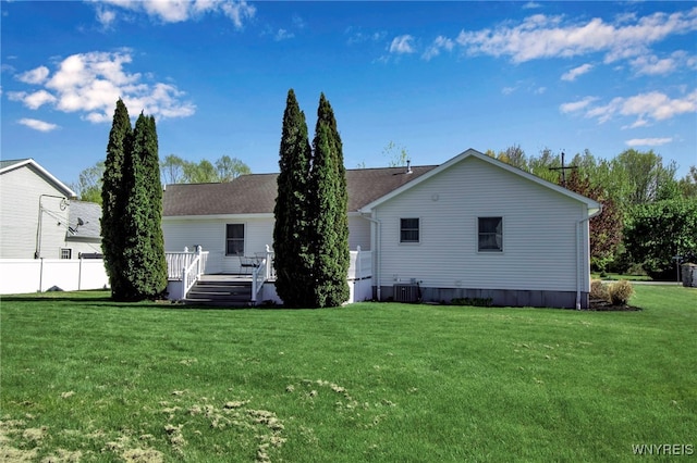 761 Pletcher Rd, Lewiston, NY 14092 - rear view of house featuring a wooden deck and central AC unit