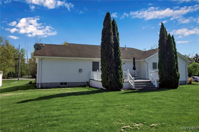 761 Pletcher Rd, Lewiston, NY 14092 - rear view of house featuring a yard and a wooden deck
