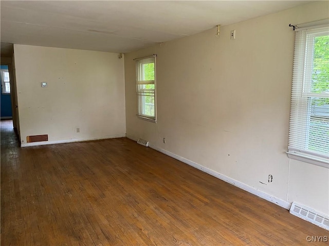 138 W Lynhurst Ave, Syracuse, NY 13205 - spare room featuring wood-type flooring and baseboards