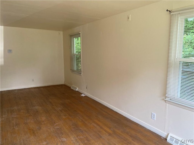 138 W Lynhurst Ave, Syracuse, NY 13205 - empty room featuring plenty of natural light and wood finished floors