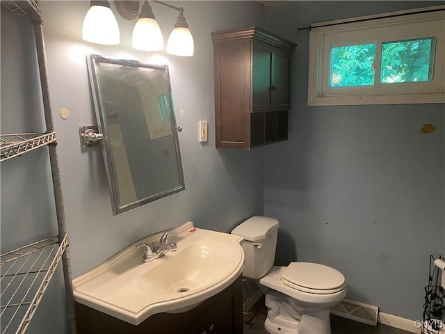 138 W Lynhurst Ave, Syracuse, NY 13205 - bathroom featuring vanity and toilet