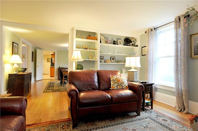 77 Hendy Creek Rd, Big Flats, NY 14905 - living room with wood finished floors and baseboards