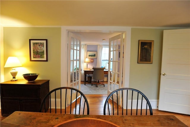 77 Hendy Creek Rd, Big Flats, NY 14905 - dining room with wood finished floors, baseboards, and a desk