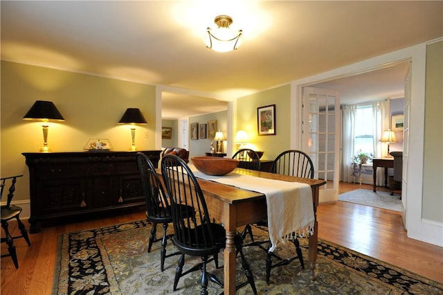 77 Hendy Creek Rd, Big Flats, NY 14905 - dining space featuring wood finished floors and baseboards