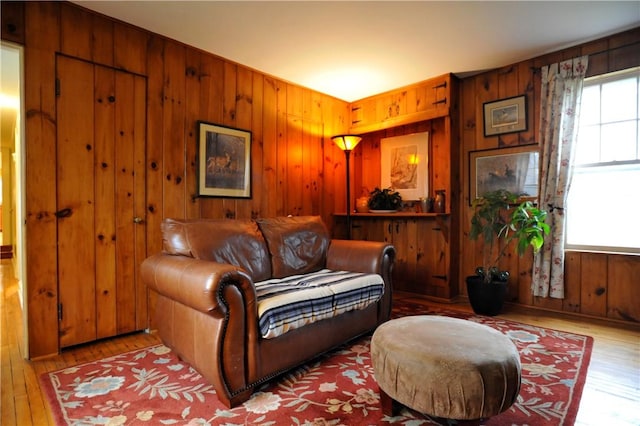 77 Hendy Creek Rd, Big Flats, NY 14905 - living area with wood-type flooring and wood walls