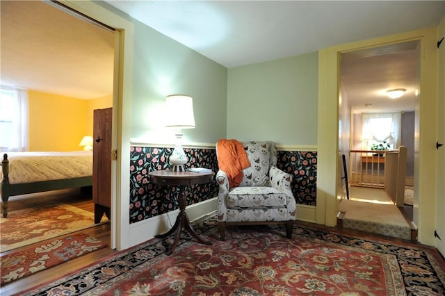 77 Hendy Creek Rd, Big Flats, NY 14905 - sitting room featuring healthy amount of natural light, wood finished floors, and baseboards
