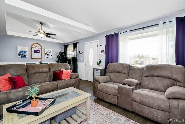 living room with lofted ceiling, wood finished floors, and ceiling fan