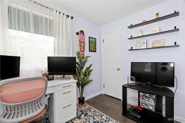 office space featuring dark wood finished floors and baseboards