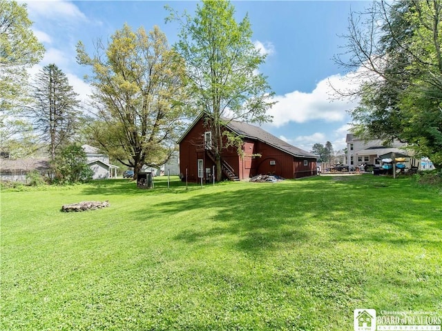 10412 Main St, Mina, NY 14736 - view of grassy yard featuring a barn