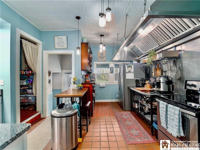 10412 Main St, Mina, NY 14736 - kitchen featuring appliances with stainless steel finishes, wall chimney exhaust hood, light tile patterned flooring, butcher block counters, and pendant lighting